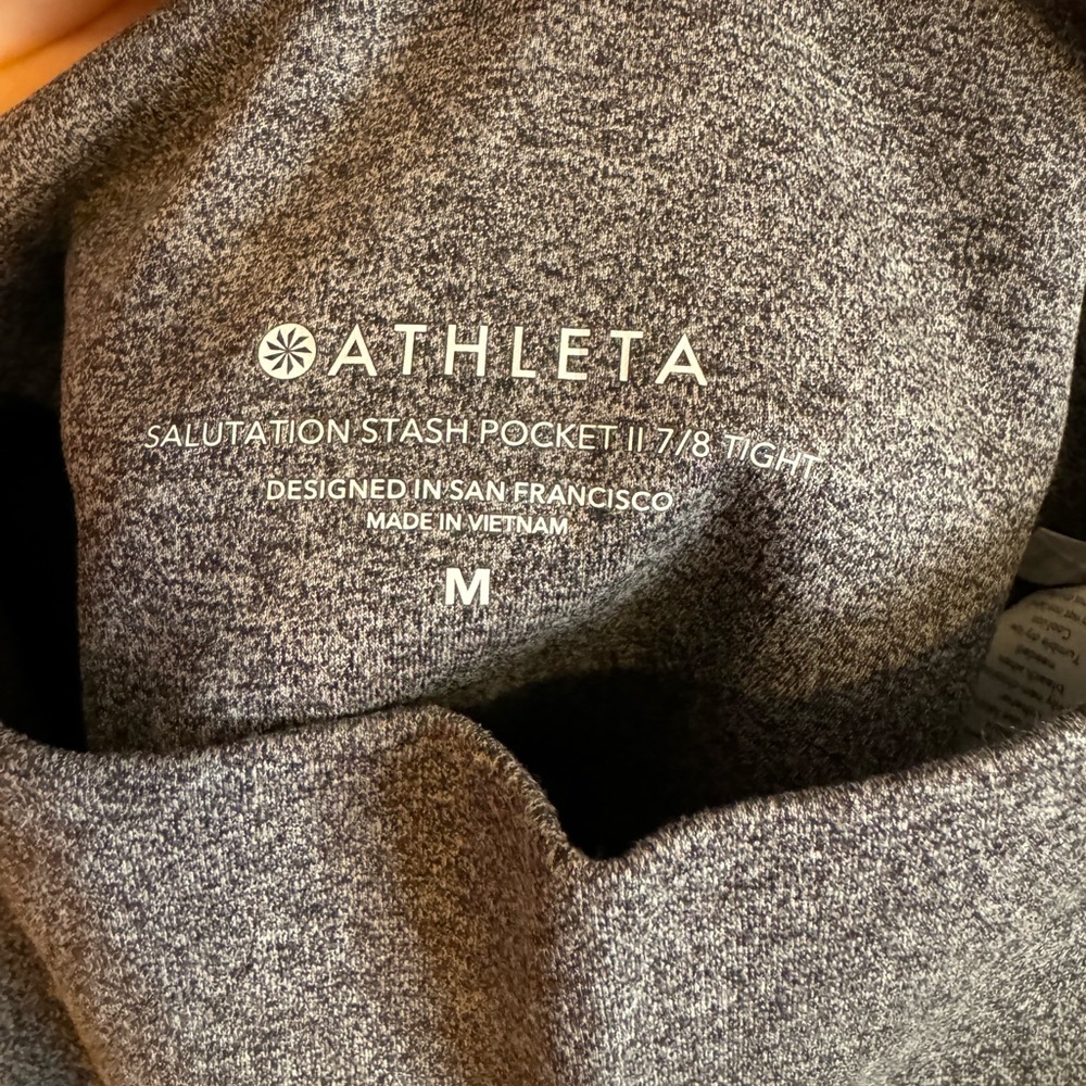Athleta salutation stash pocket II 7/8